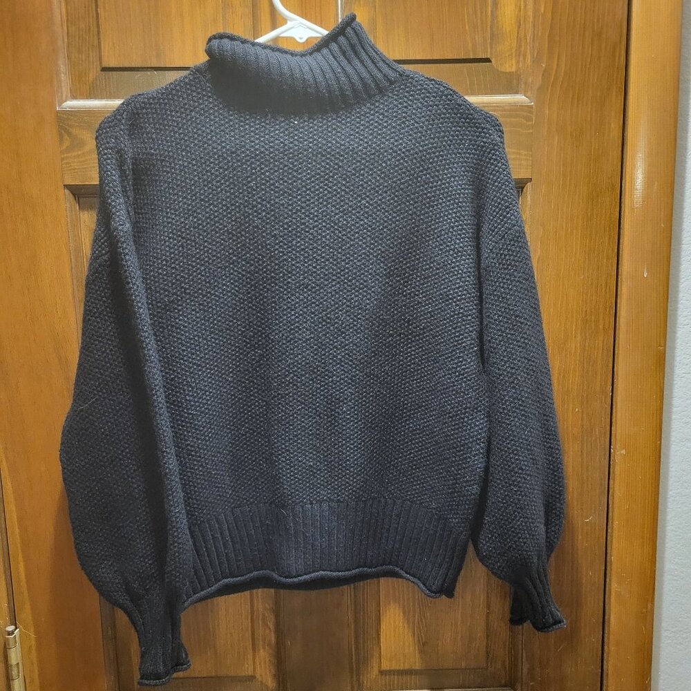 Black turtleneck sweater